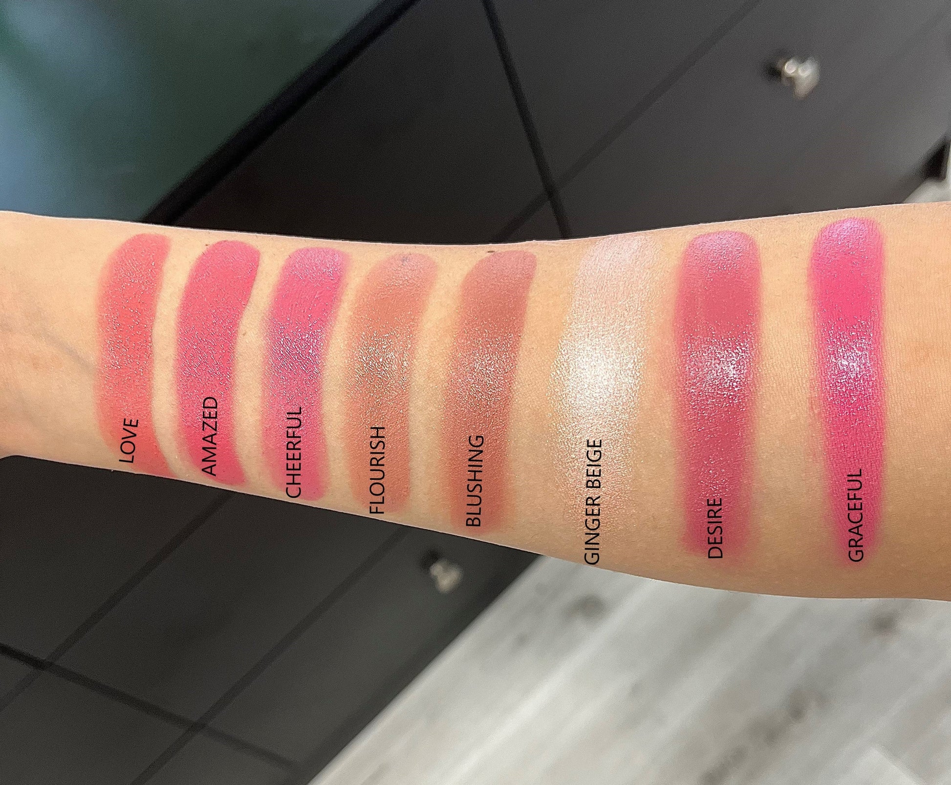 zavendria image of a girls arm with blush swatches showing the different colors of the blush